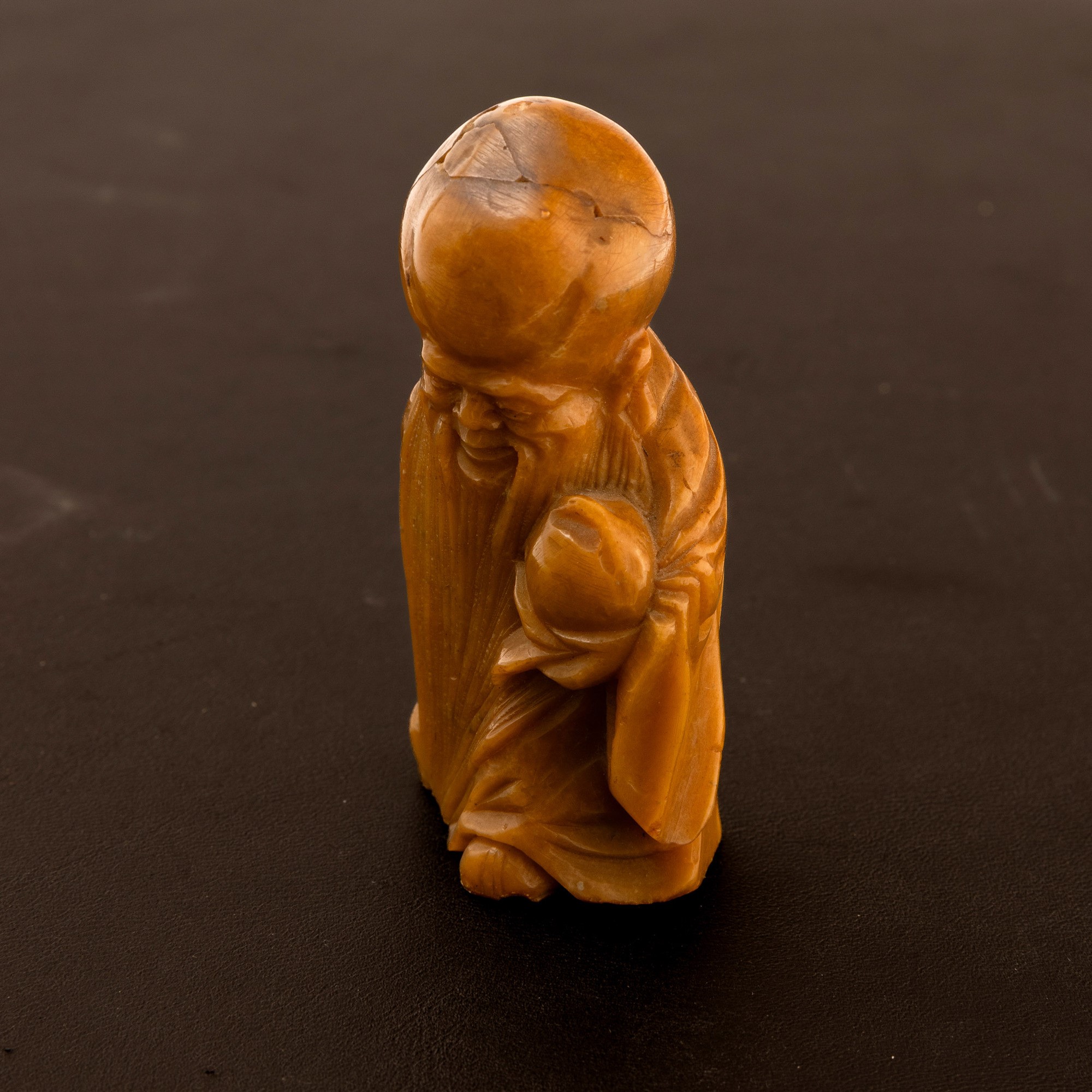 Figura in pietra saponaria raffigurante Shou Lao, Cina, Dinastia Qing, XIX secolo