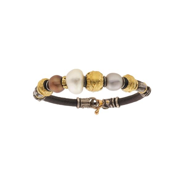 Pearl, gold and silver bracelet. Signed Misani