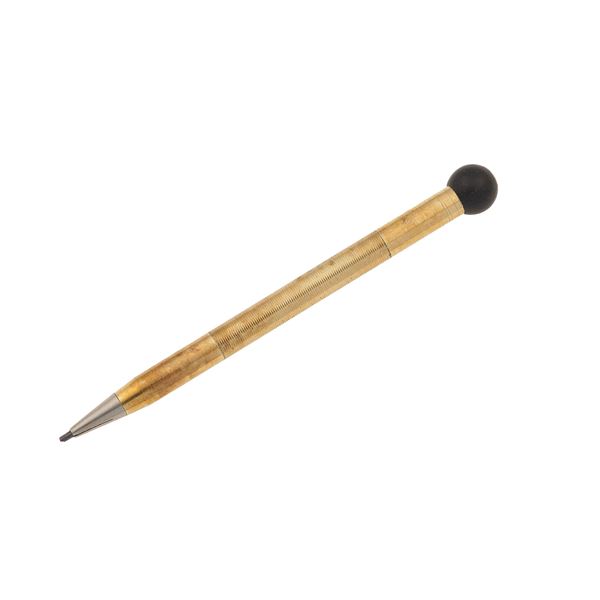 Two gold jewels and gold-plated propelling pencil