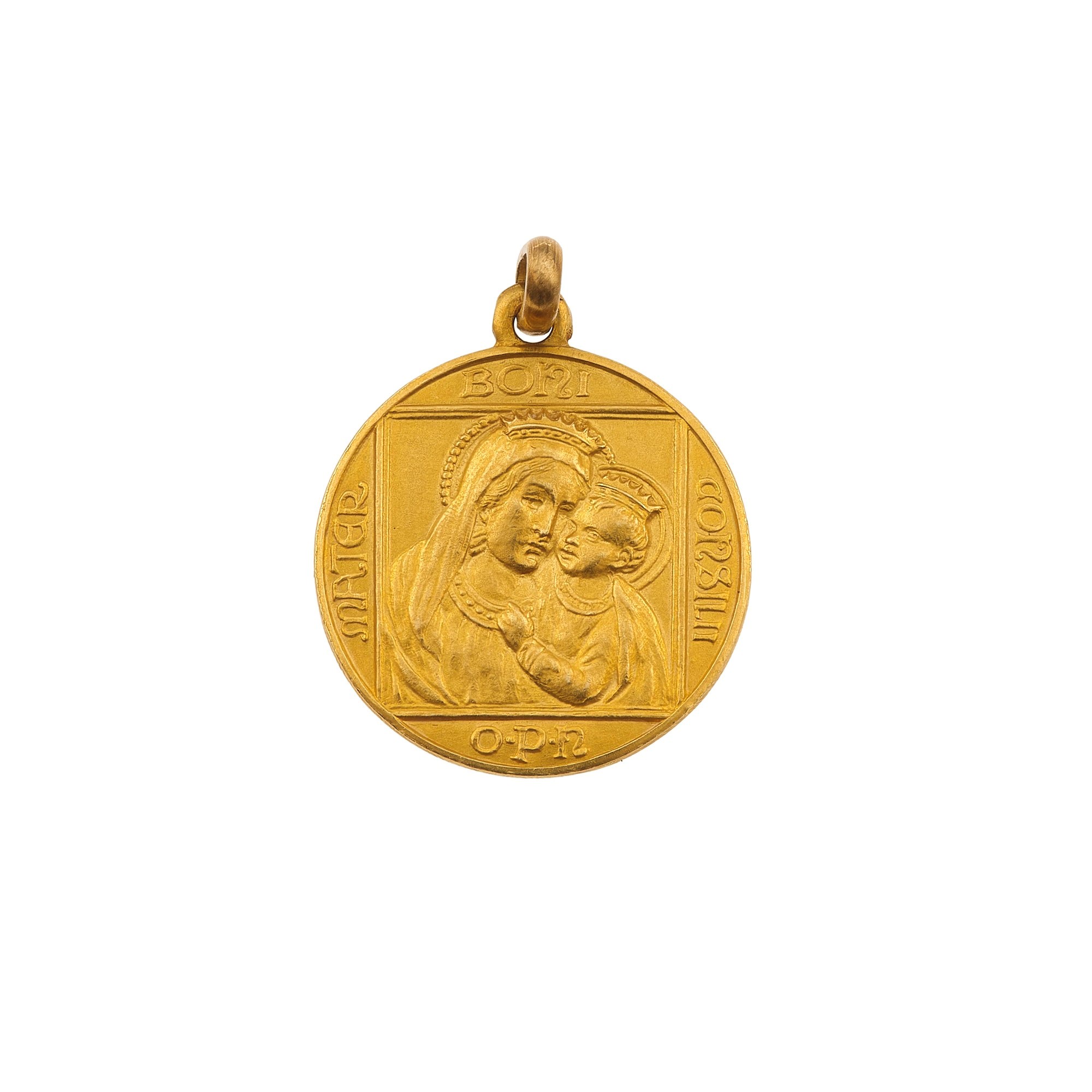 Lotto composto da un portamine, una medaglietta incisa ed una piccola spilla con medaglia