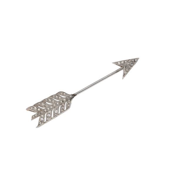 Diamond and platinum "Arrow" brooch. Minor damages