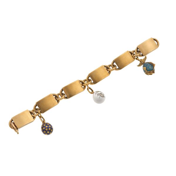 Low-karat gold bracelet with enamel pendent. The pendent signed Fabergé. Two pendent with workmaster August Frederik Hollming mark's