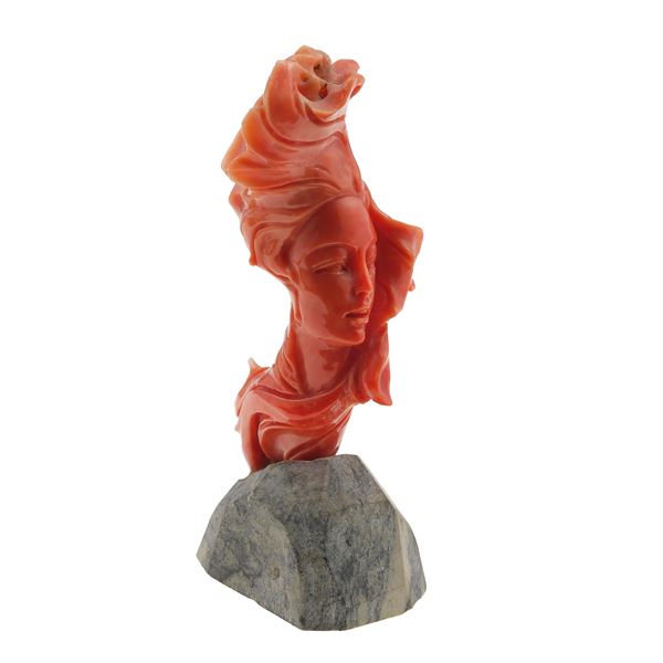 Carved coral on hardstone base