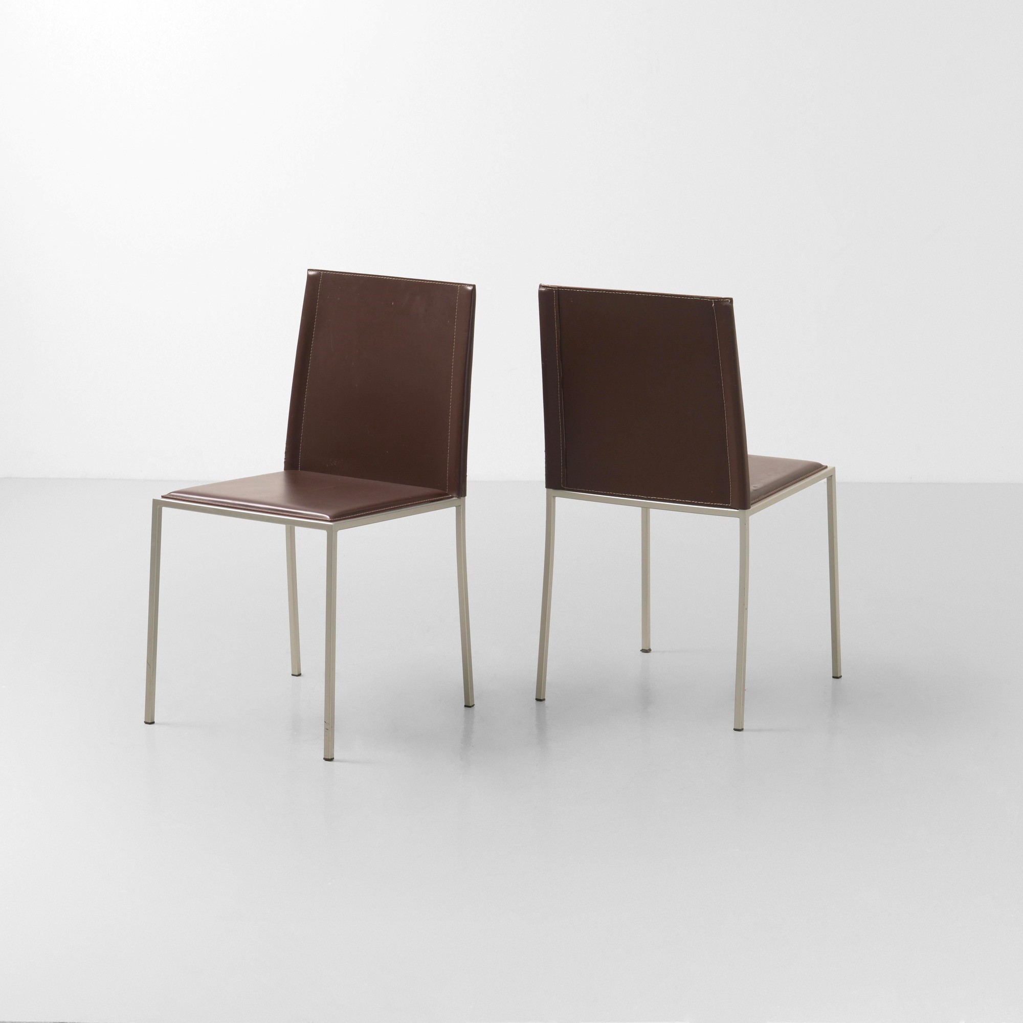 Calligaris - Due sedie in metallo con rivestimento in cuoio