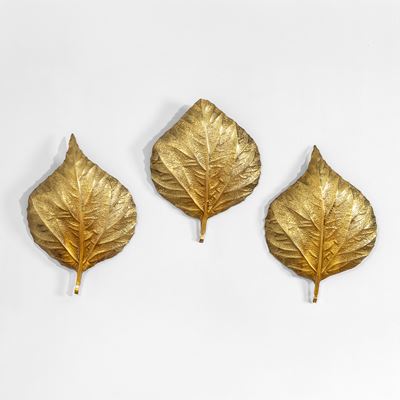 Tre lampade da parete in ottone