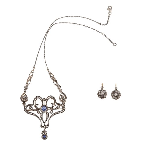 Lotto composto da una collana con pendente/spilla con rosette di diamante e zaffiri sintetici ed un paio di orecchini con rosette di diamante