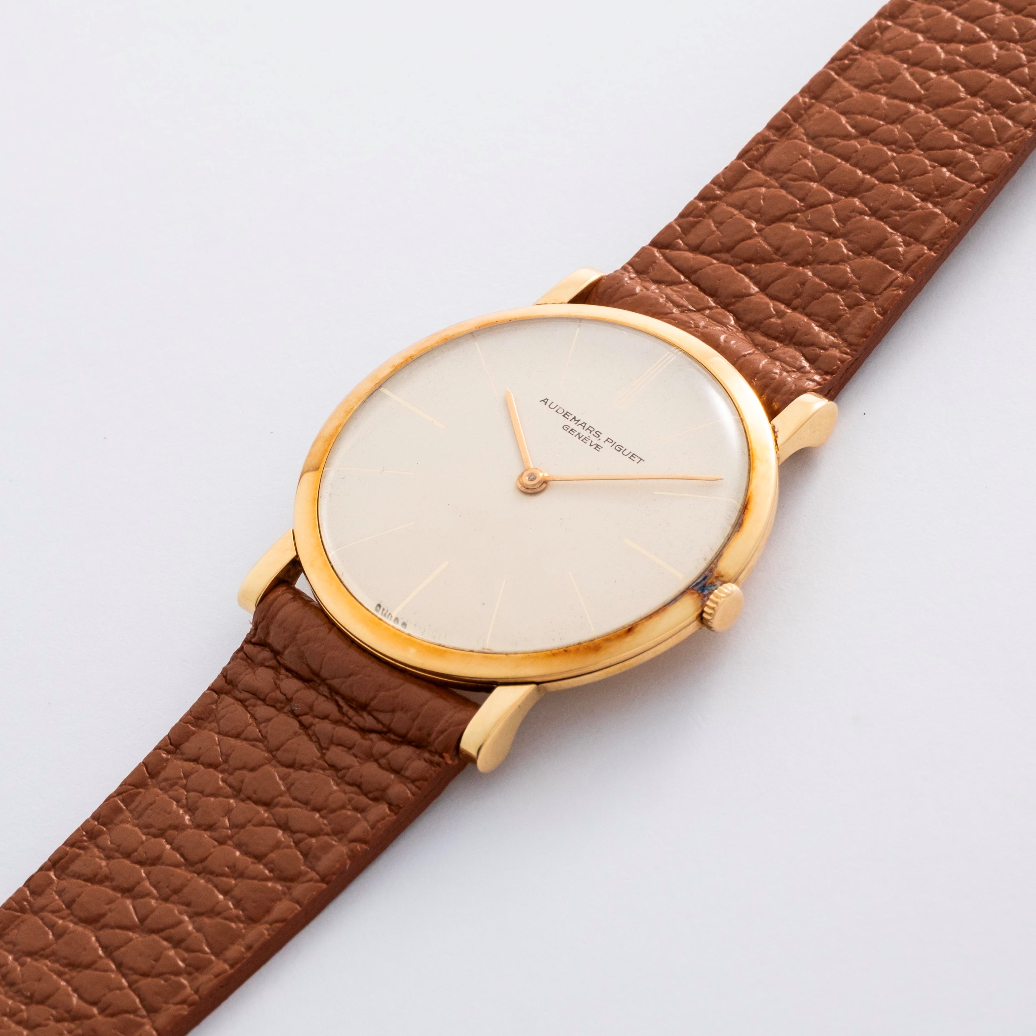 Audemars Piguet - Extrapiatto ref. 5043, oro giallo 18k, quadrante bianco con indici dorati, circ...