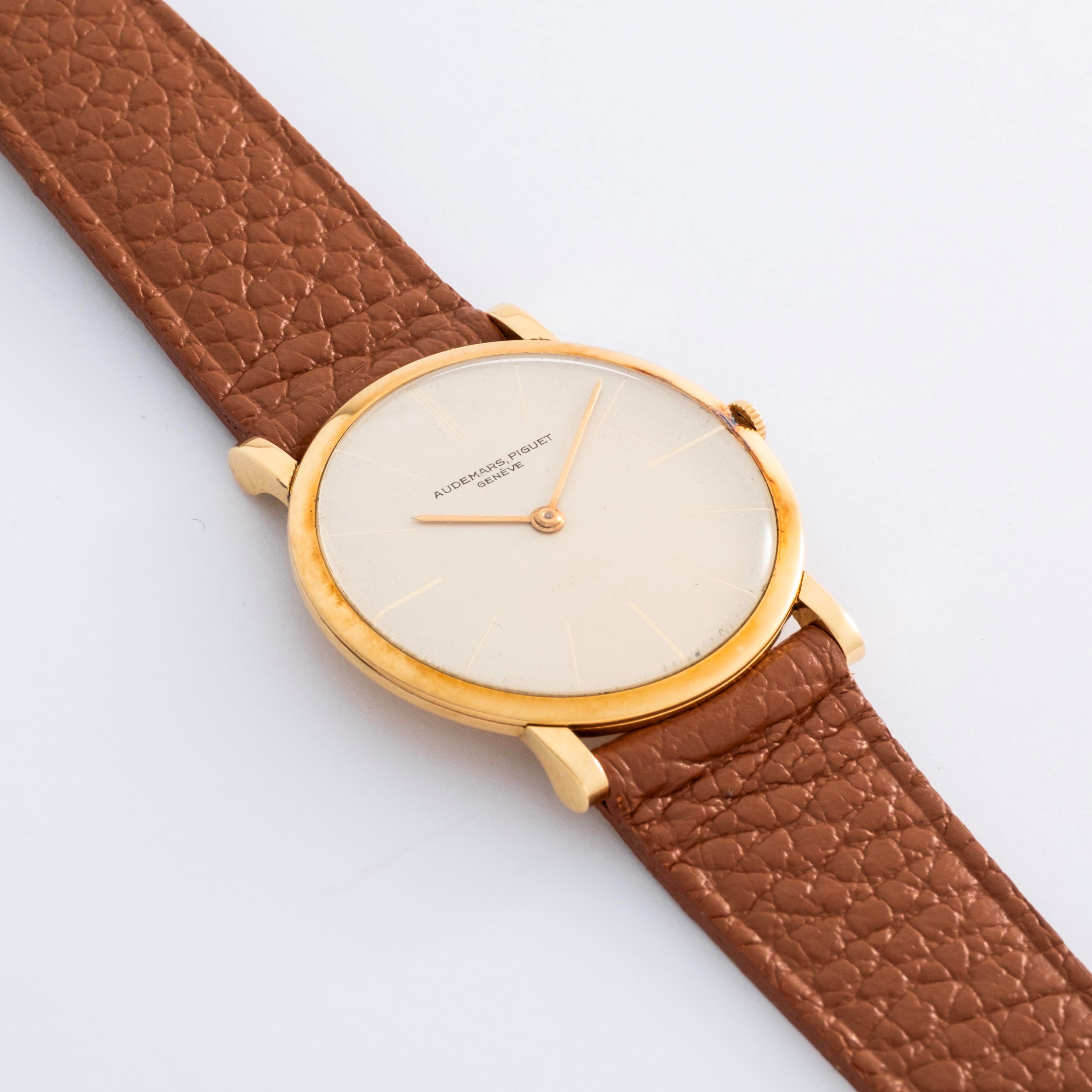 Audemars Piguet - Extrapiatto ref. 5043, oro giallo 18k, quadrante bianco con indici dorati, circ...