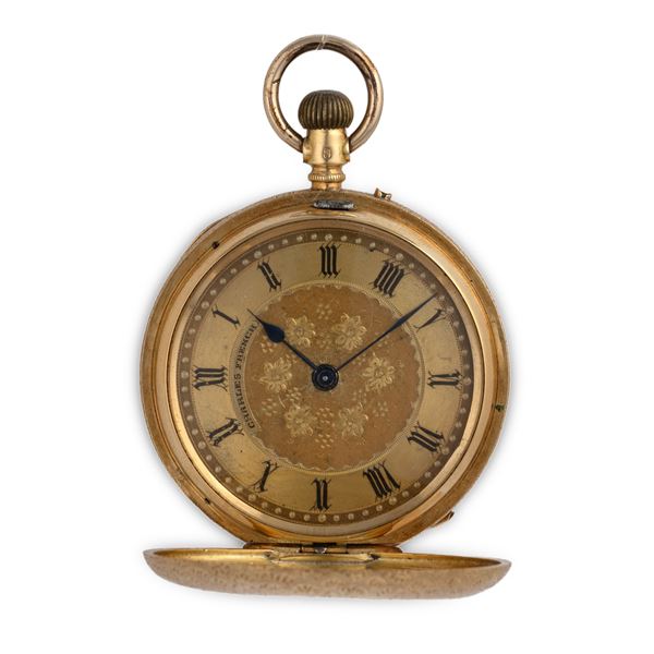 Savonette in oro giallo 18k con cassa e coperchio decorati, quadrante champagne con numeri Romani decorato con motivi floreali<BR>41 mm, peso 54 g<BR>