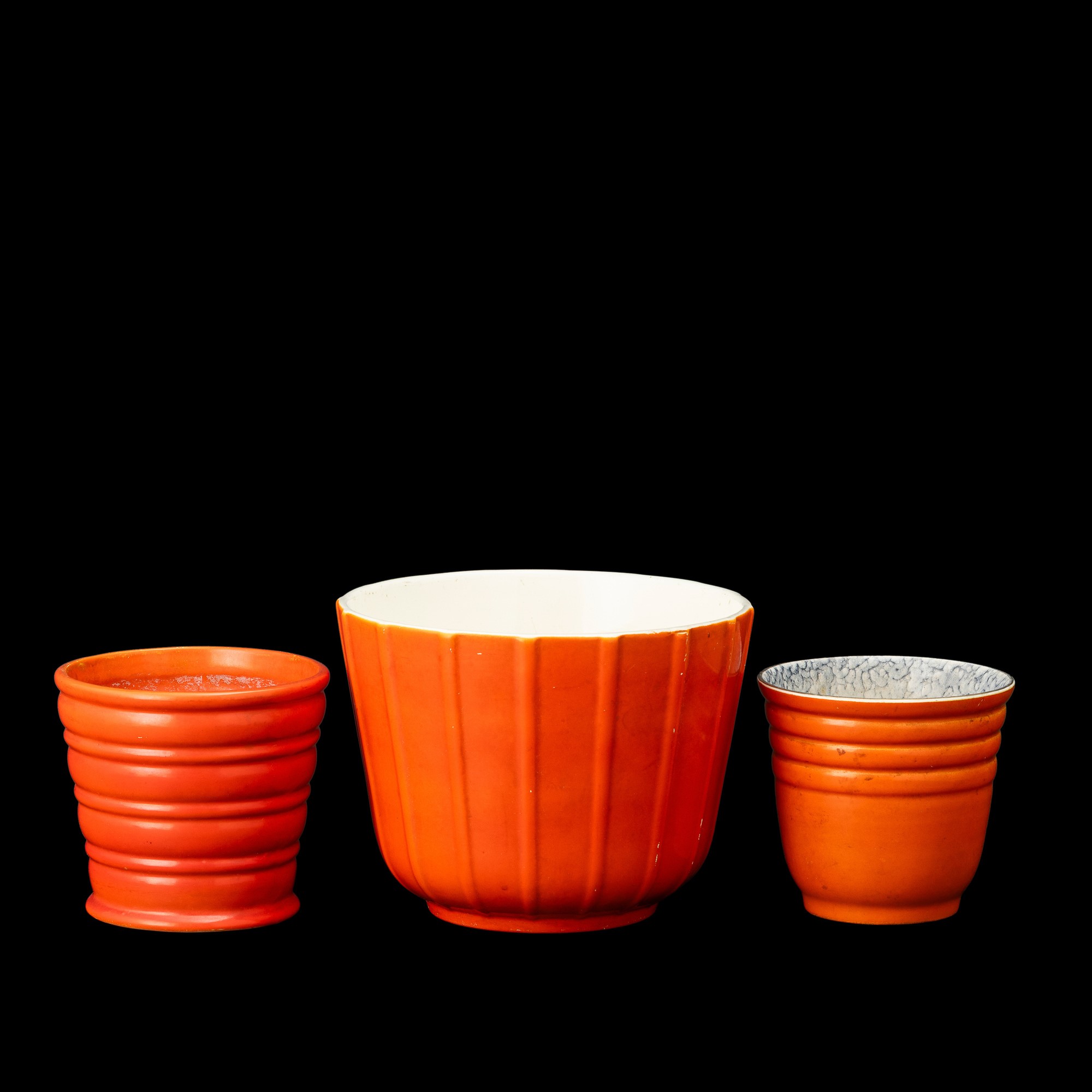 Richard Ginori, San Cristoforo; S.C.I., Laveno e Ceramiche Pozzi, tre cachepot in terraglia smalt...