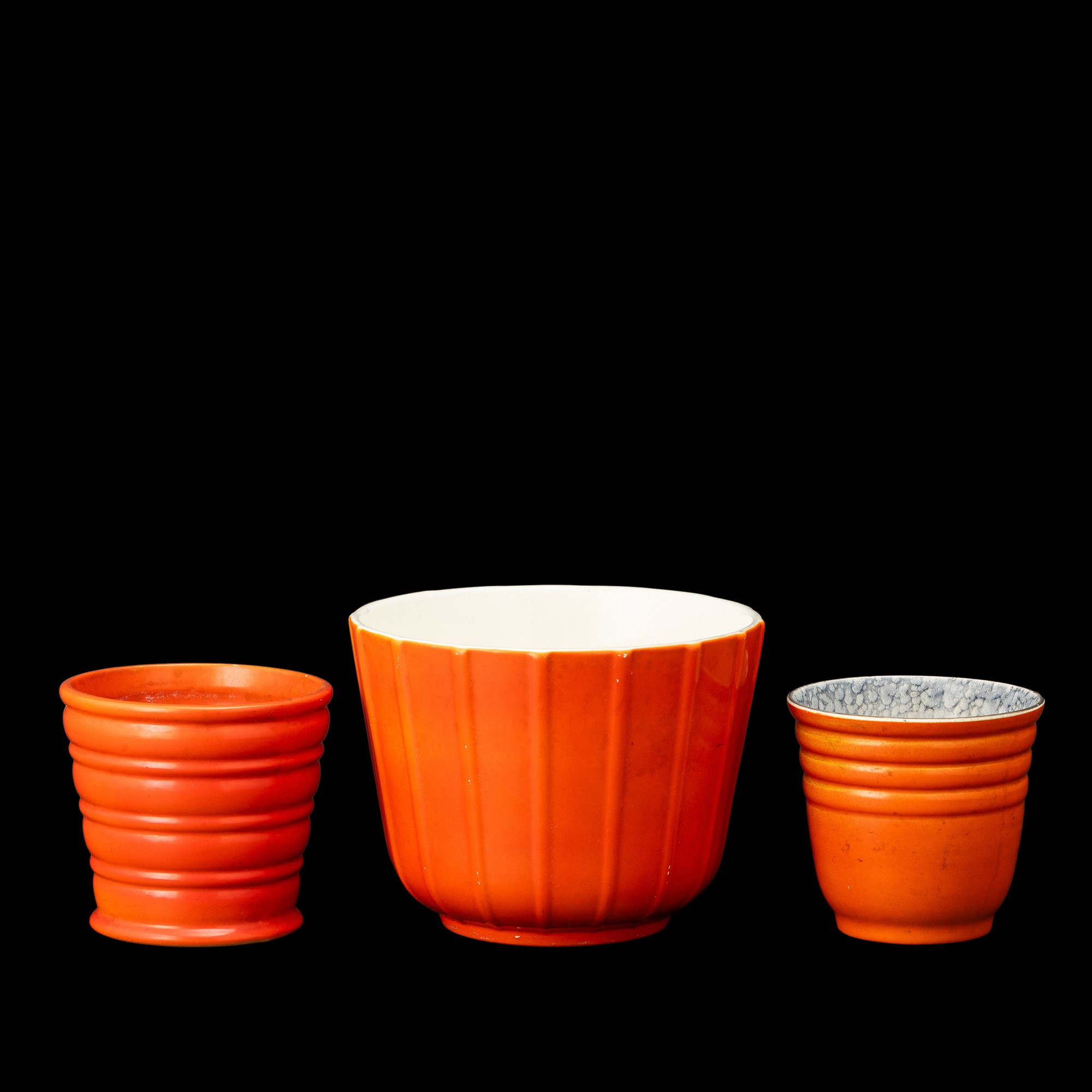 Richard Ginori, San Cristoforo; S.C.I., Laveno e Ceramiche Pozzi, tre cachepot in terraglia smalt...