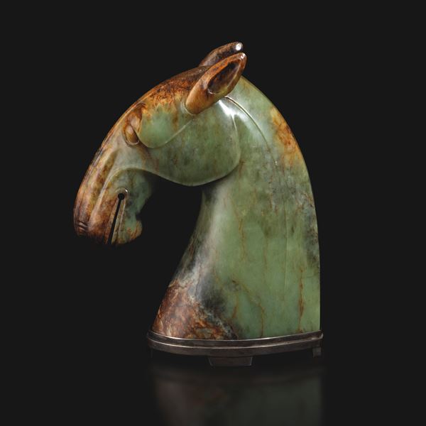 Rare and important celadon and russet jade horse head, China, Ming Dynasty, 17th century.