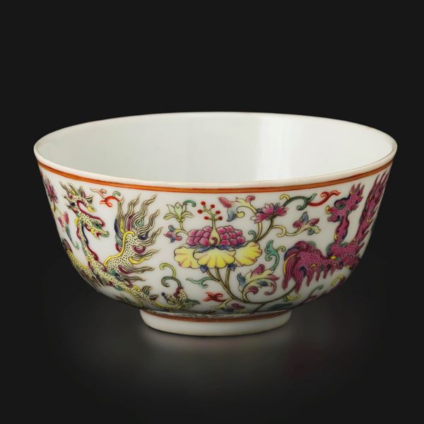 Famille rose porcelain cup depicting phoenixes with branches and lotus flowers, China, Qing Dynasty, Guangxu mark and period (1875–1908).