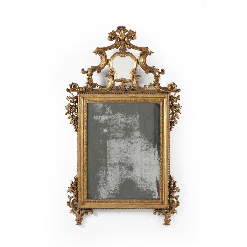 Specchiera con cornice in legno intagliato e dorato. XVIII-XIX secolo  - Asta Antiquariato - Cambi Casa d'Aste