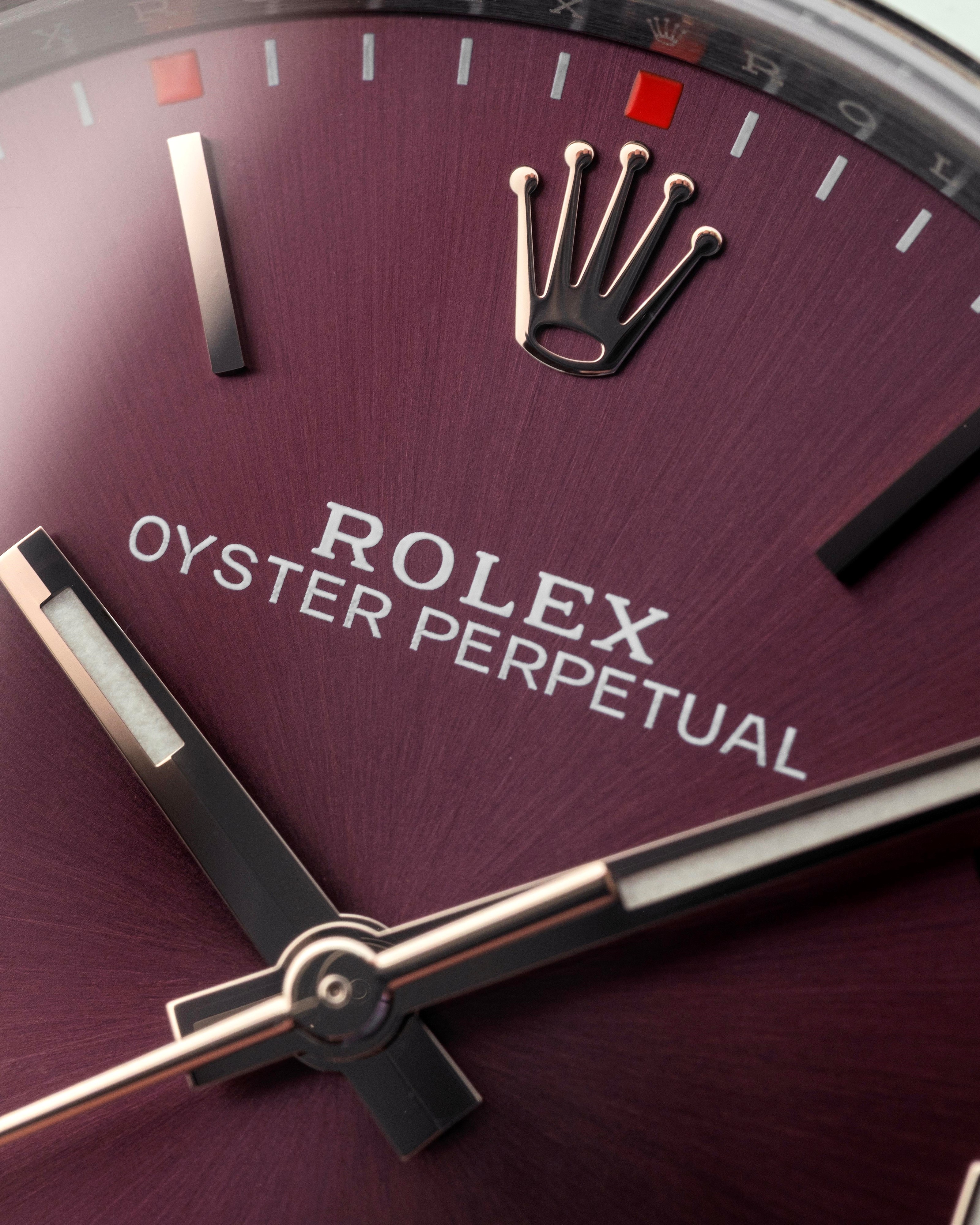 Rolex - Oyster Perpetual 114300 in acciaio, quadrante vinaccia Soleil