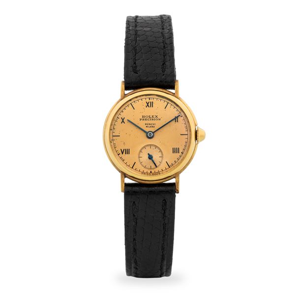 Rolex - Solo tempo in oro giallo 18k, quadrante champagne firmato “Ronchi Milano” con numeri Romani e piccoli secondi al sei, circa 1938