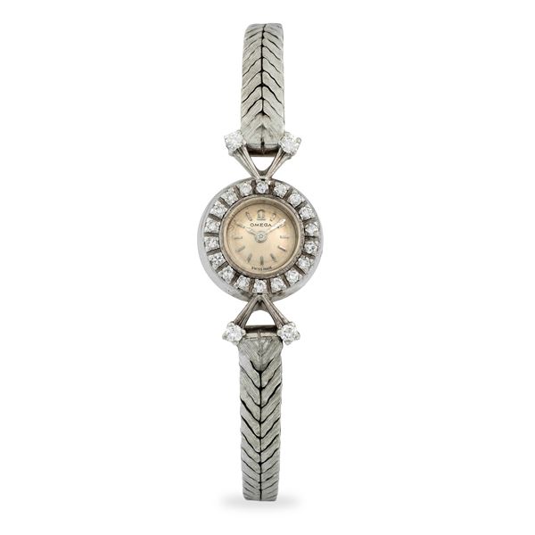 Omega - Elegante Cocktail Watch in oro bianco 18k con ghiera e anse impreziosite da diamanti, quadrante argentè con indici applicati, circa 1947