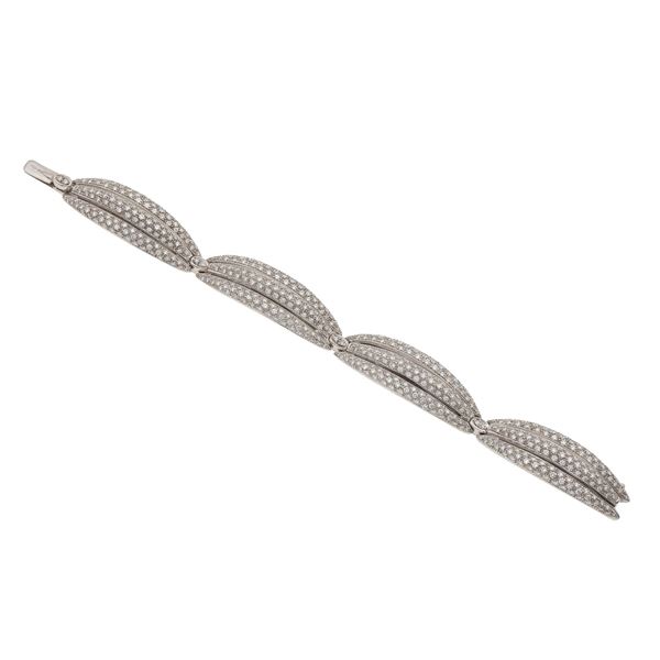 Diamond and gold bracelet. Signed Damiani