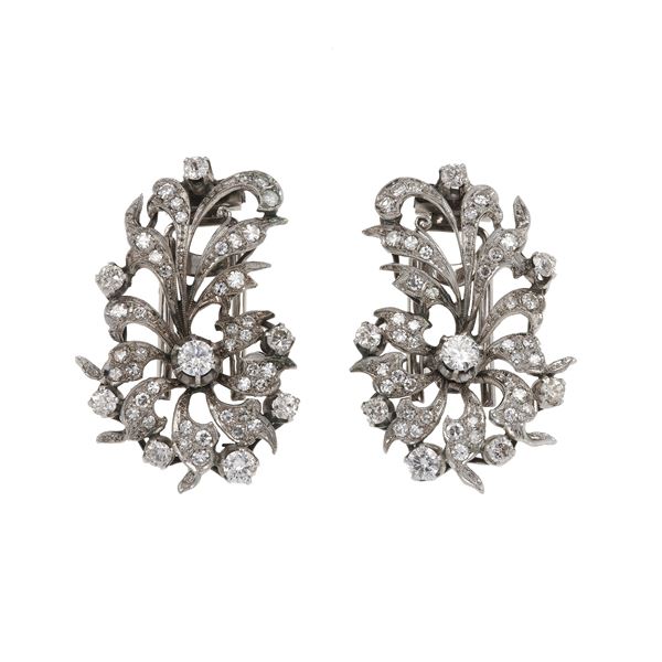Pair of diamond and platinum earrings, convertible into two clips