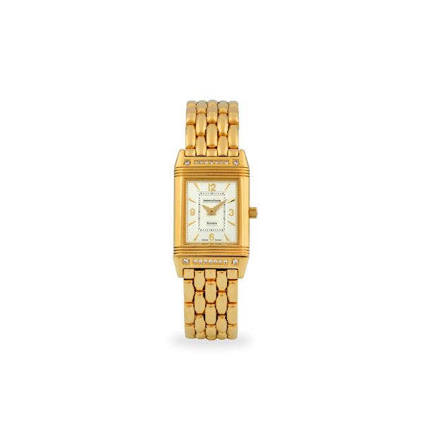 Reverso ref. 260.1.86 in oro giallo 18k e brillanti, quadrante argentè bitonale Guillochè con indici applicati, garanzia originale e libretti, circa 1990