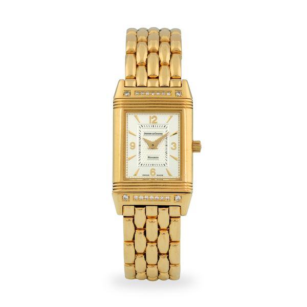 Jaeger-LeCoultre - Reverso ref. 260.1.86 in oro giallo 18k e brillanti, quadrante argentè bitonale Guillochè con indici applicati, garanzia originale e libretti, circa 1990