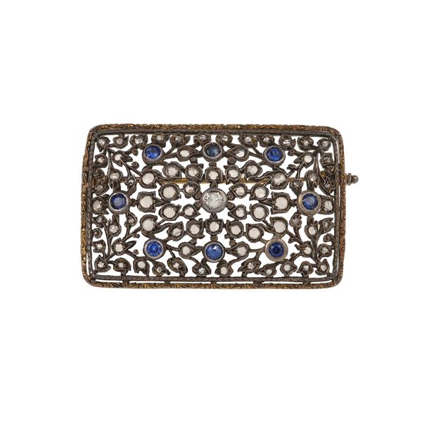Spilla con rosette di diamante e zaffiri sintetici