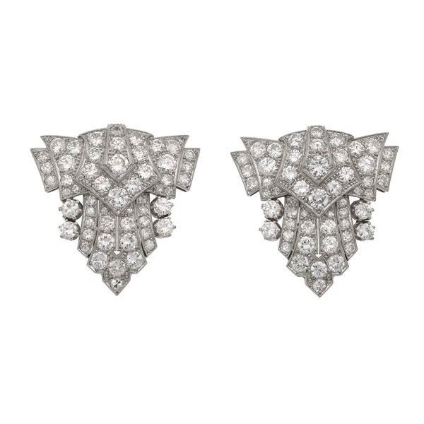 Pair of diamond, platinum and gold clips. Convertible into a pendent