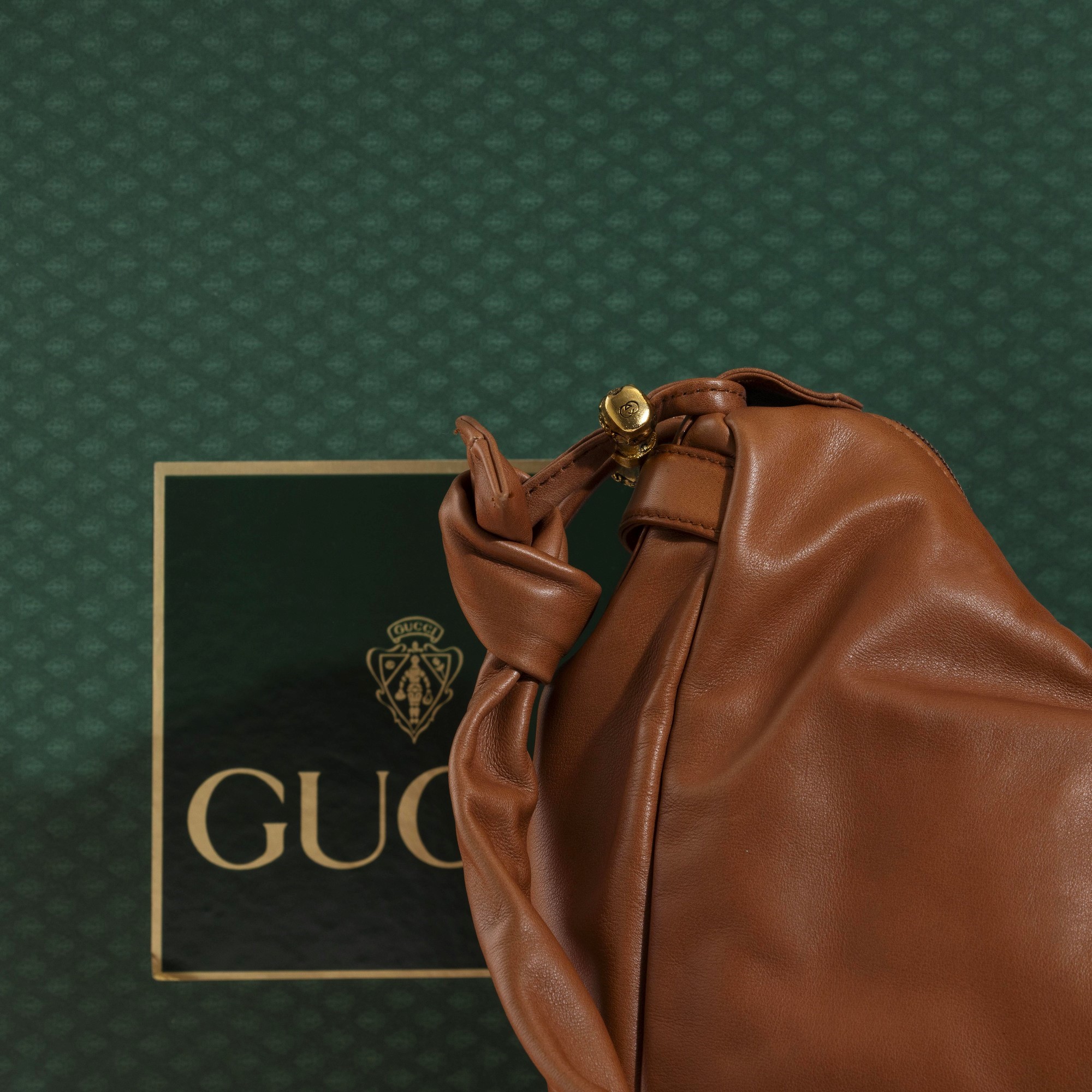 Gucci - Borsa a tracolla in pelle marrone