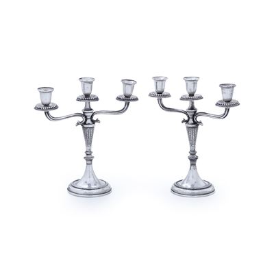 Mario Sorelli, Coppia di candelabri in argento fuso e sagomato (Firenze, XX secolo)