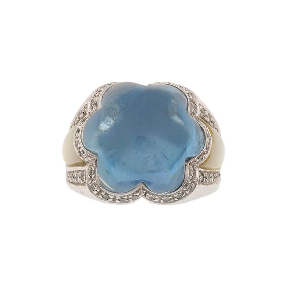 Topaz, mother-of-pearl and gold ring. Topaz damaged