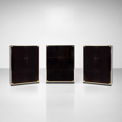 Italia (produzione), Tre mobili contenitori, legno laminato, particolari in ottone e cristallo co...