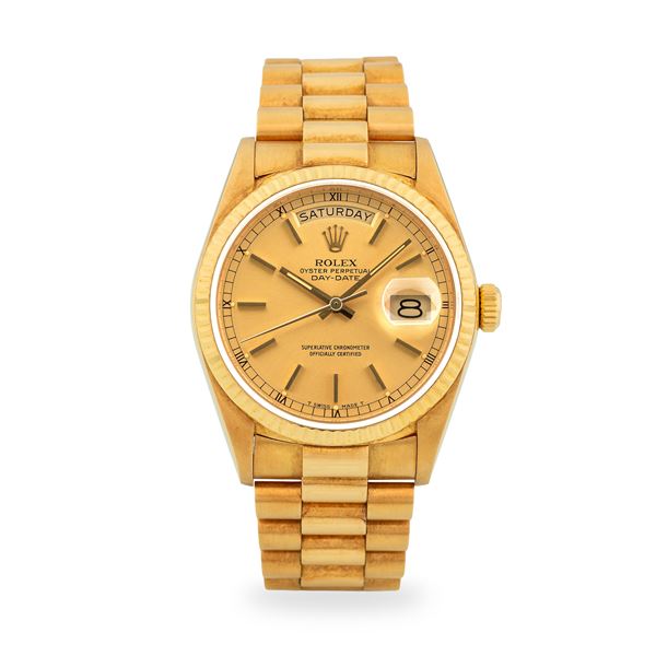 Rolex - Day-Date President ref. 18038 in oro giallo 18k, quadrante champagne e minuteria con numeri Romani, con scatola originale, circa 1984