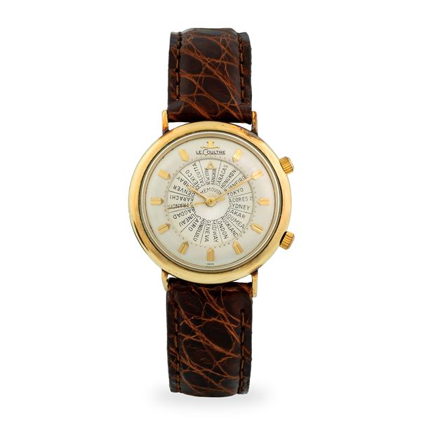LeCoultre - Memovox svegliarino "Ore del mondo" ref. 3041 laminato oro, quadrante argentè a due settori con indicazione dei fusi orari mondiali, circa 1960
