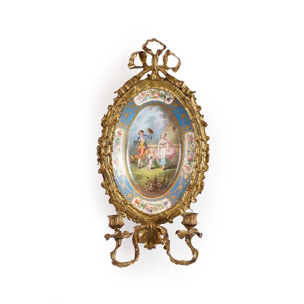 Applique in metallo dorato. Fine XIX-inizi XX secolo