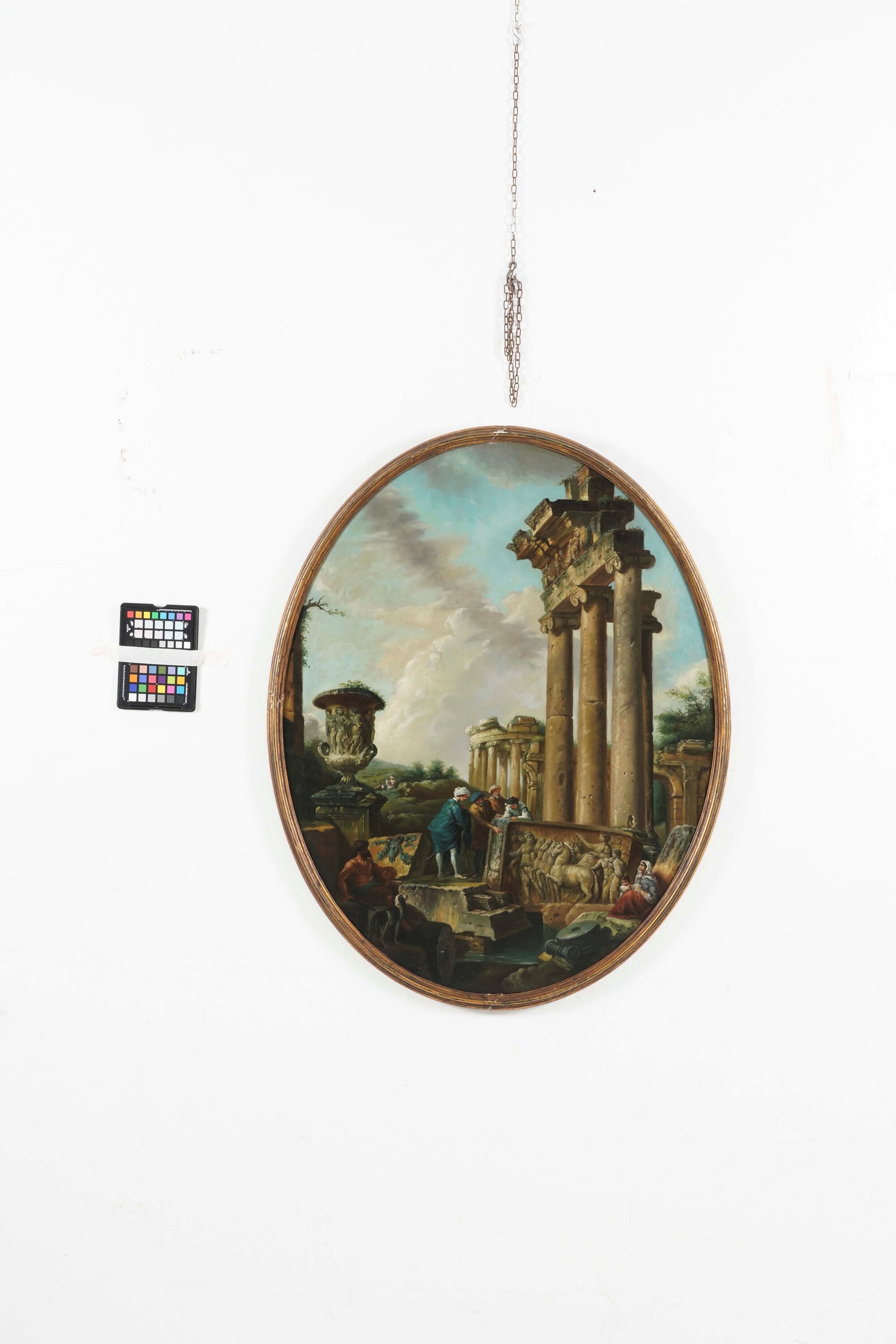 Giovanni Paolo Panini - Paesaggi con rovine e figure (coppia), olio su cartone ovale