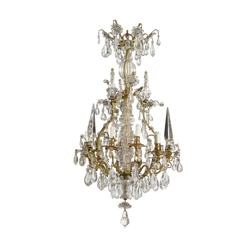 Lampadario in metallo dorato e cristalli di Rocca.  - Asta Dimore Italiane - Cambi Casa d'Aste