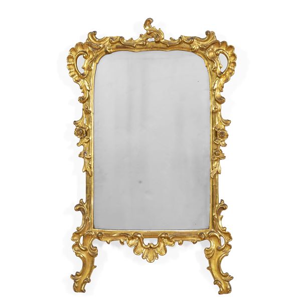 Specchiera in legno intagliato e dorato. XIX secolo