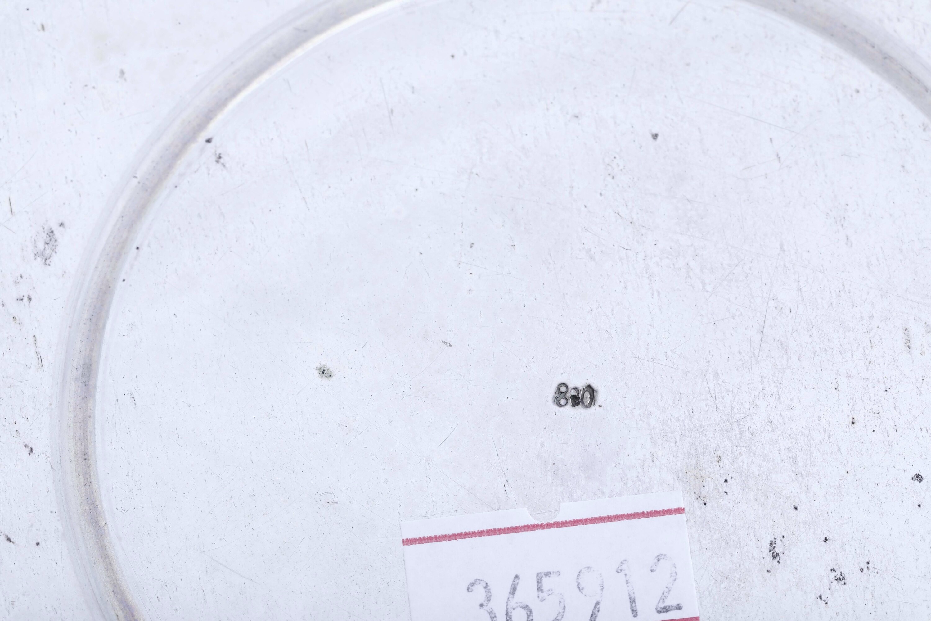 Argenteria italiana della prima metà del XX secolo, Coppia di sottobottiglia in argento fuso e sa...