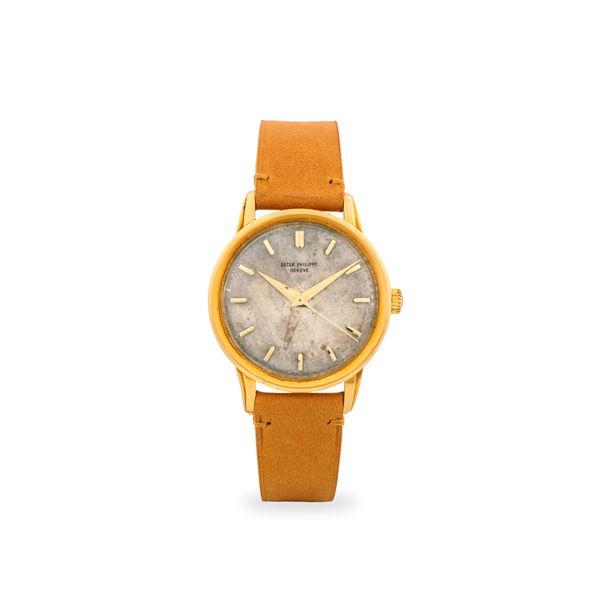 Raffinato Calatrava ref. 2481 in oro giallo 18k, quadrante argentè in patina con indici applicati e lancette Dauphine, circa 1958
