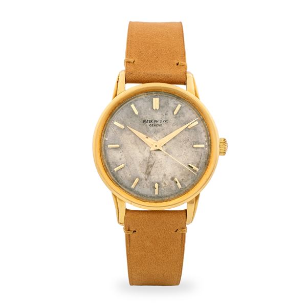 Patek Philippe - Raffinato Calatrava ref. 2481 in oro giallo 18k, quadrante argentè in patina con indici applicati e lancette Dauphine, circa 1958