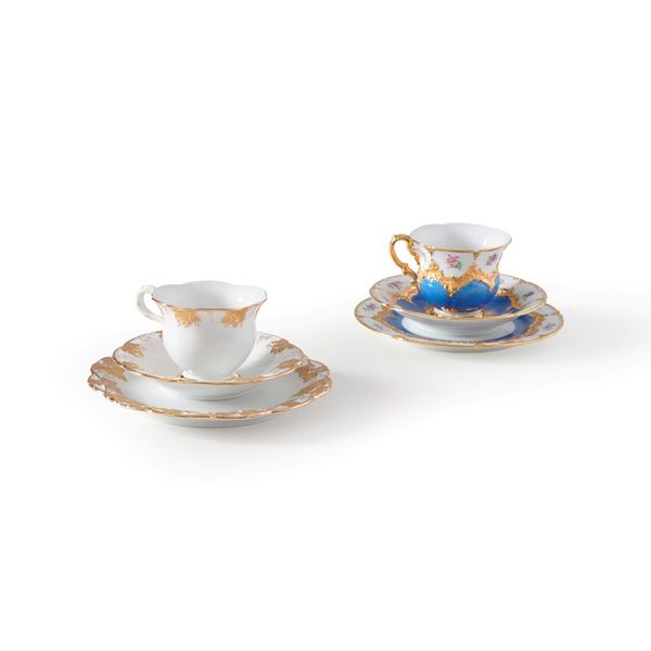 Due tazze con piattino e sottopiatto. Meissen, XX secolo.