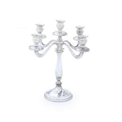 Candelabro, argento fuso e sagomato con bollo dell’argentiere consunto (XX secolo)