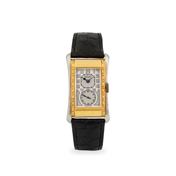 Prince ref. 971 in oro giallo 18k e acciaio con cassa lavorata, quadrante argentè bitonale con piccoli secondi al sei, circa 1938