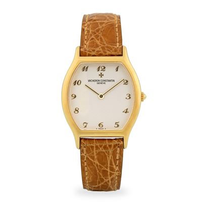 Les Essentielles Tonneau, orologio in oro giallo 18k con quadrante argenté guillochè (circa 1994)