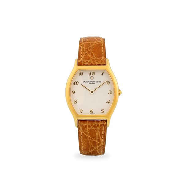 Les Essentielles Tonneau in oro giallo 18k, quadrante argentè Guillochè con numeri Breguet, con estratto d'archivio, circa 1994