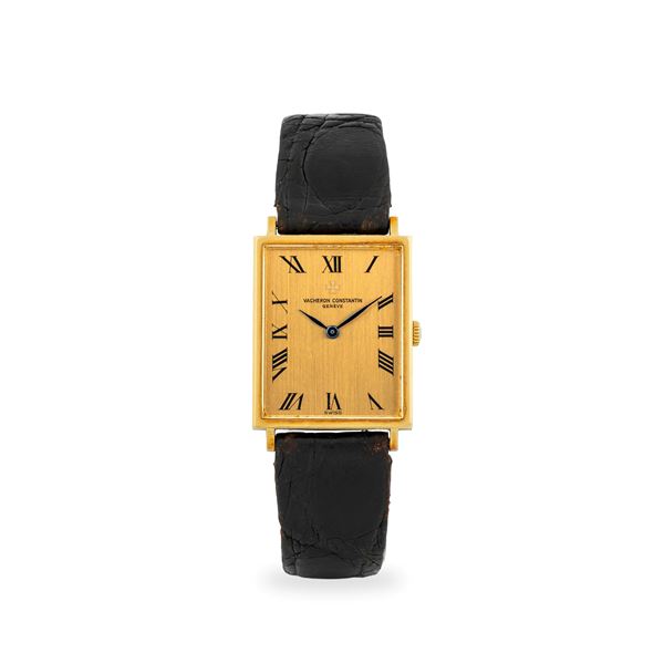 Orologio di forma ref. 39011 in oro giallo 18k, quadrante champagne con numeri Romani, con estratto d'archivio, circa 1978