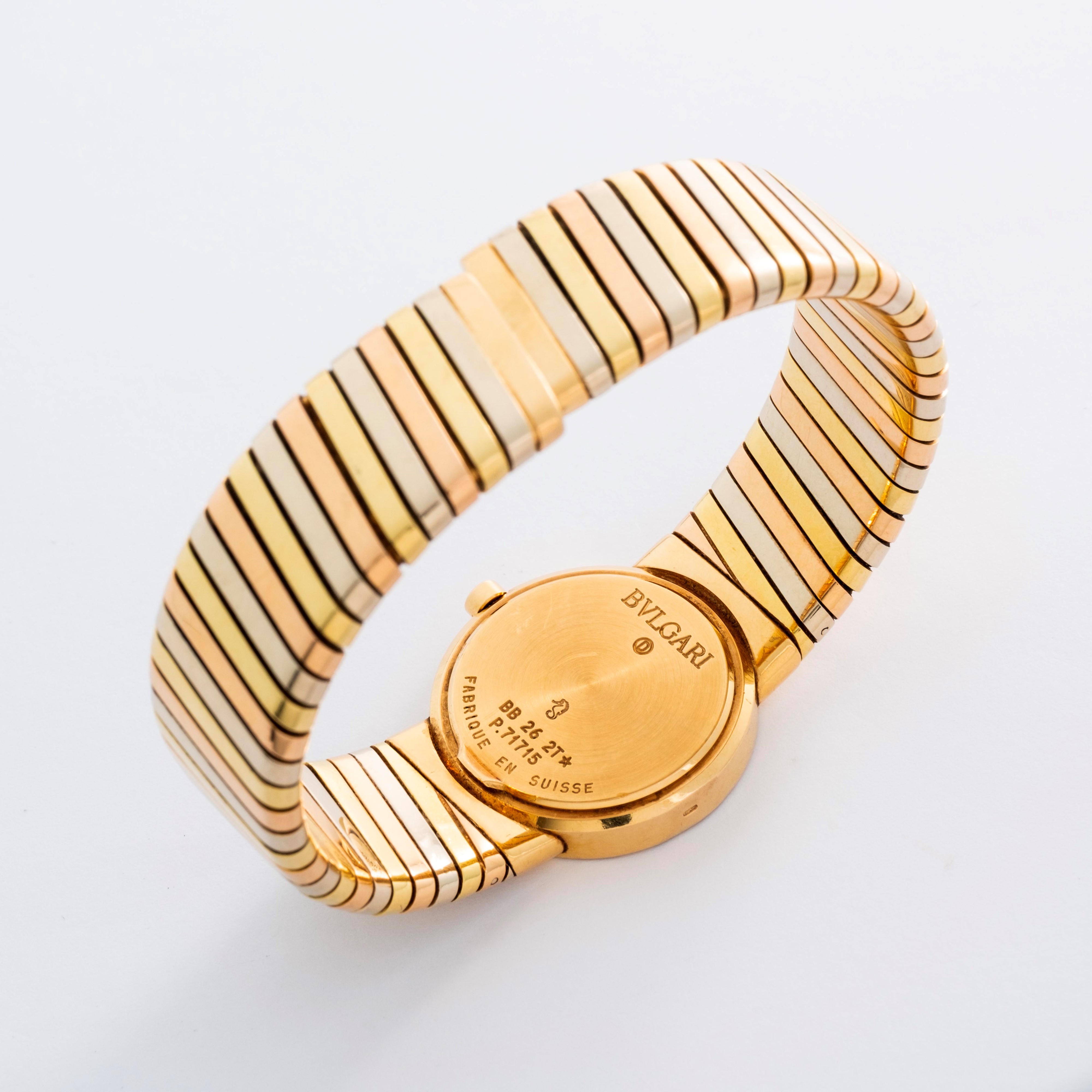 Bulgari - Tubogas in oro 18k giallo, rosa e bianco con quadrante nero, circa 1990