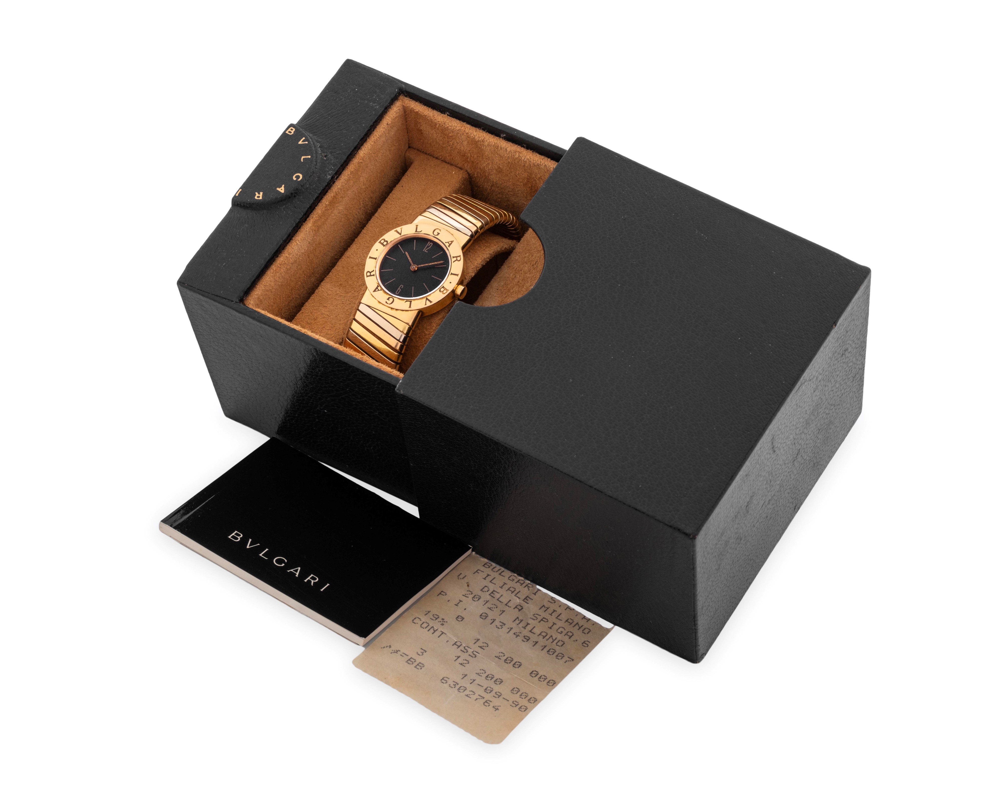 Bulgari - Tubogas in oro 18k giallo, rosa e bianco con quadrante nero, circa 1990