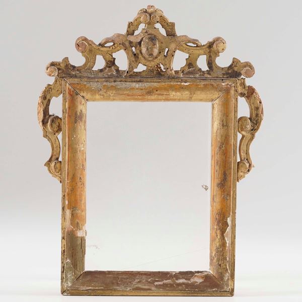 Cornice in legno intagliato e dorato. XIX secolo
