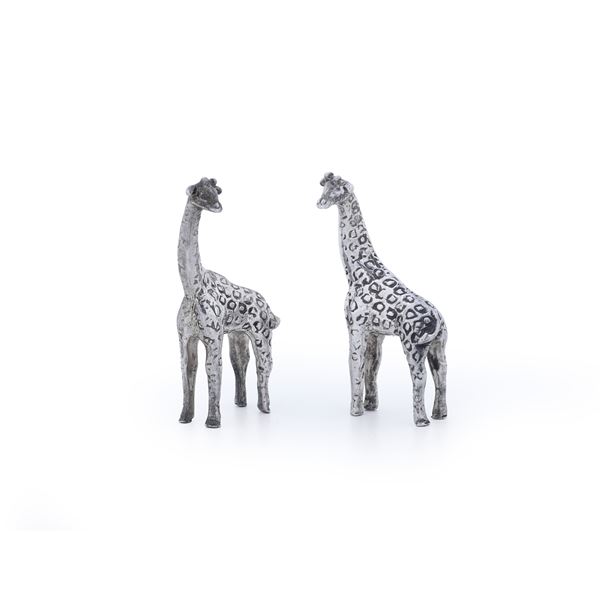 Coppia di giraffe in miniatura. XX secolo